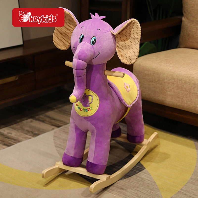 Enchanting Purple Elephant Plush Rocking Horse with Polka Dot Ears and Floral Saddle - Whimsical Ride-On Rocker for Kids W16D189
